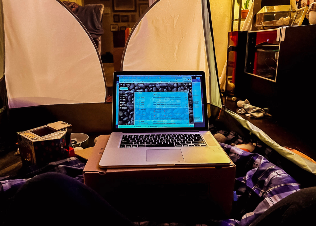 I talk a lot about creating a designated workspace swhen you work at home. Sometimes, it doesn't happen. This is what working at home looks like, sometimes. It is important to separate work from home, otherwise they bleed into each other and it is hard to mindfully work on either one. But.. Someone needs something, your workspace gets used for something else (dinner, crafts, storage). #unlikelywahm | #workathomemom | #workspace | #workathomewithkids