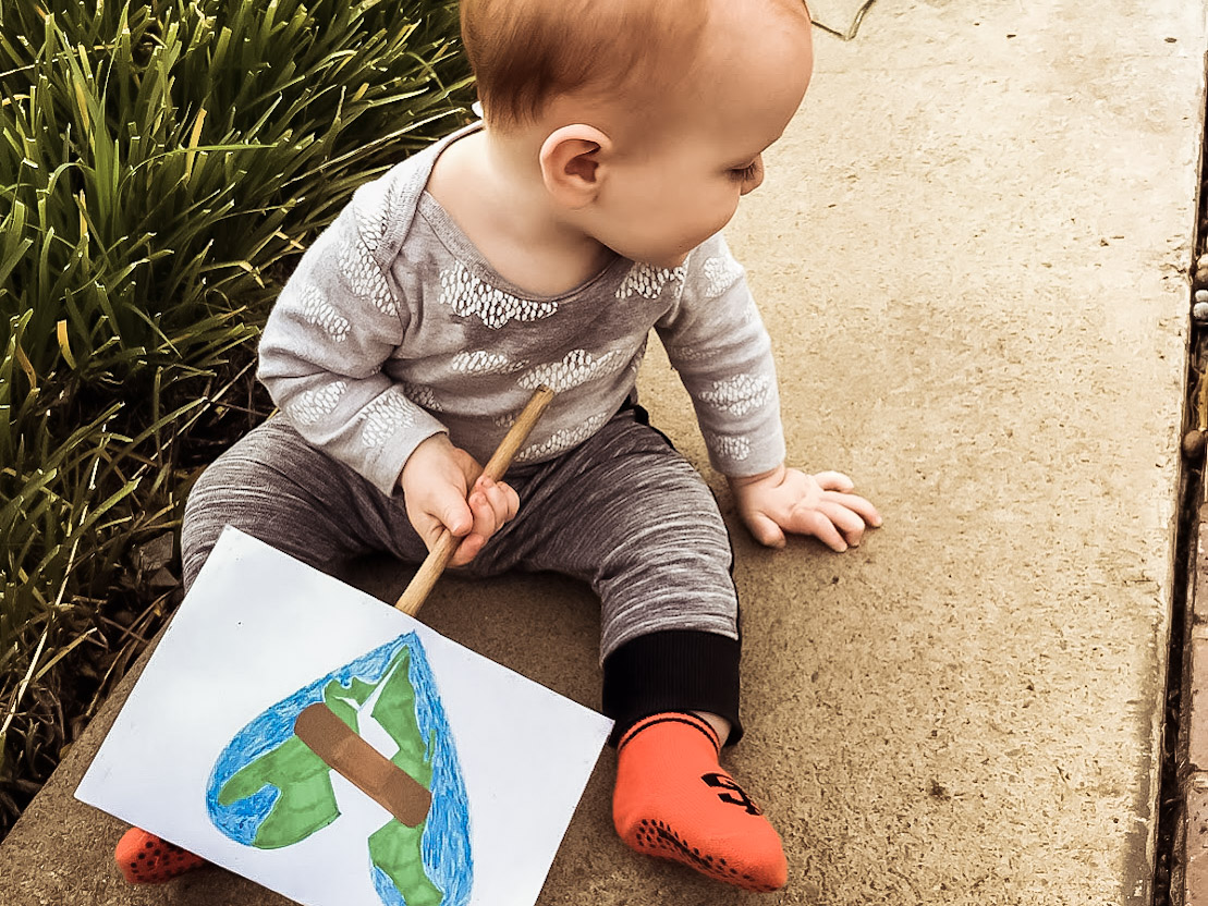 Teaching environmentalism is a lot like teaching any other important value. Like honesty and humor, I want to teach my kids to love the earth. Here are 7 things I do to raise kids who care about the environment. #unlikelywahm | #environmentalistkids | #naturalmama | #greenmama